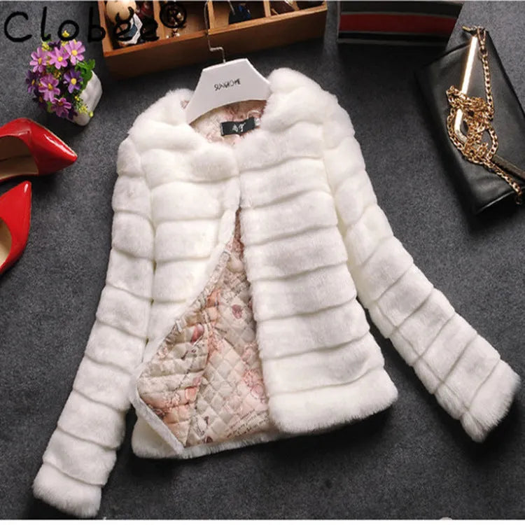 Women's short length faux fur top in white, black or beige with regular sleeves, 40cm length