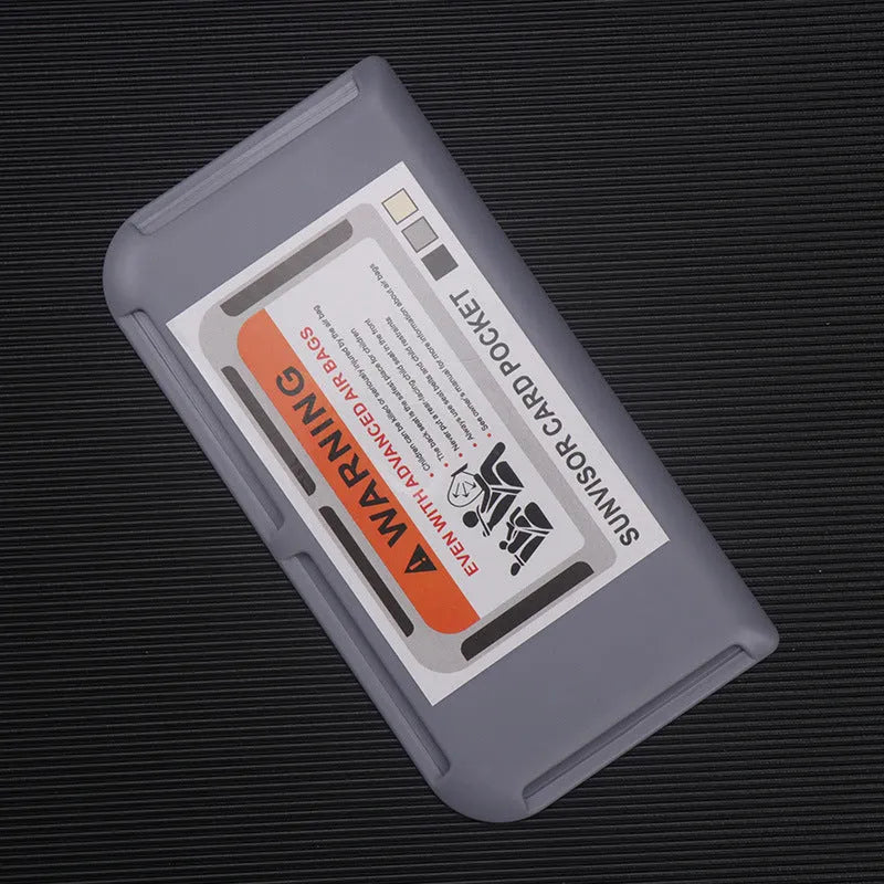 Black car sun visor card holder with four slots for driving licence and parking permits
