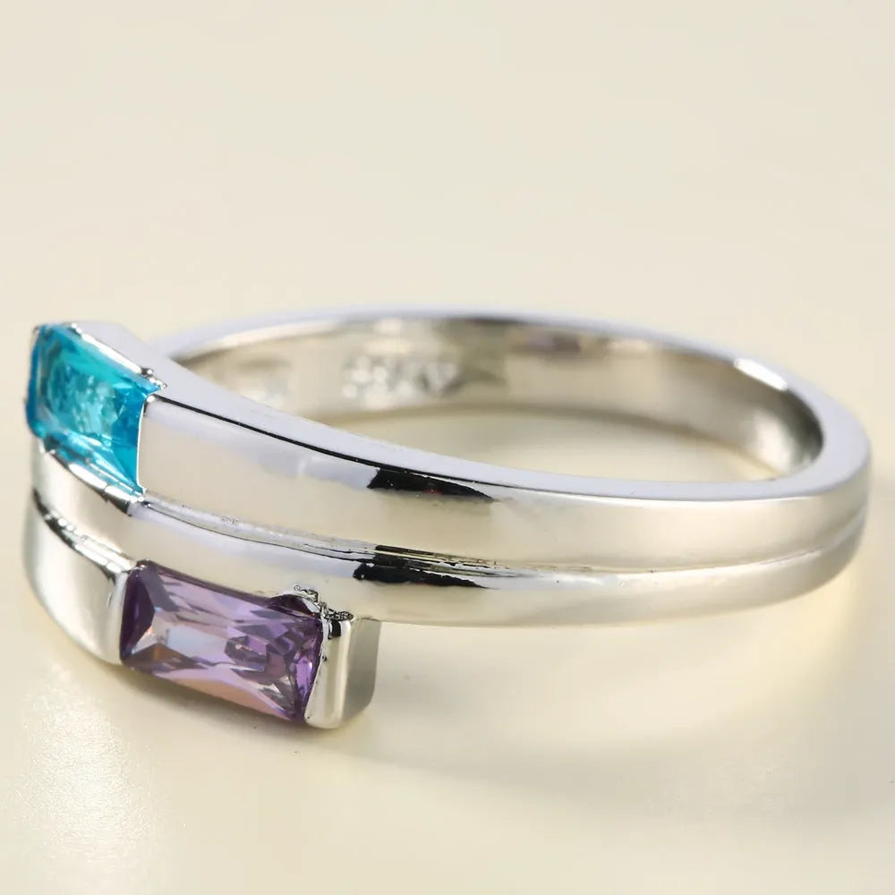 Silver-colour electroplated copper ring with inlaid zircon stones, shown in Ins style.