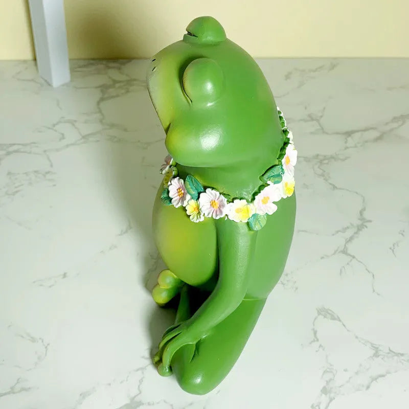 Magic yoga frog figurine in RDW123 colour on a tabletop.