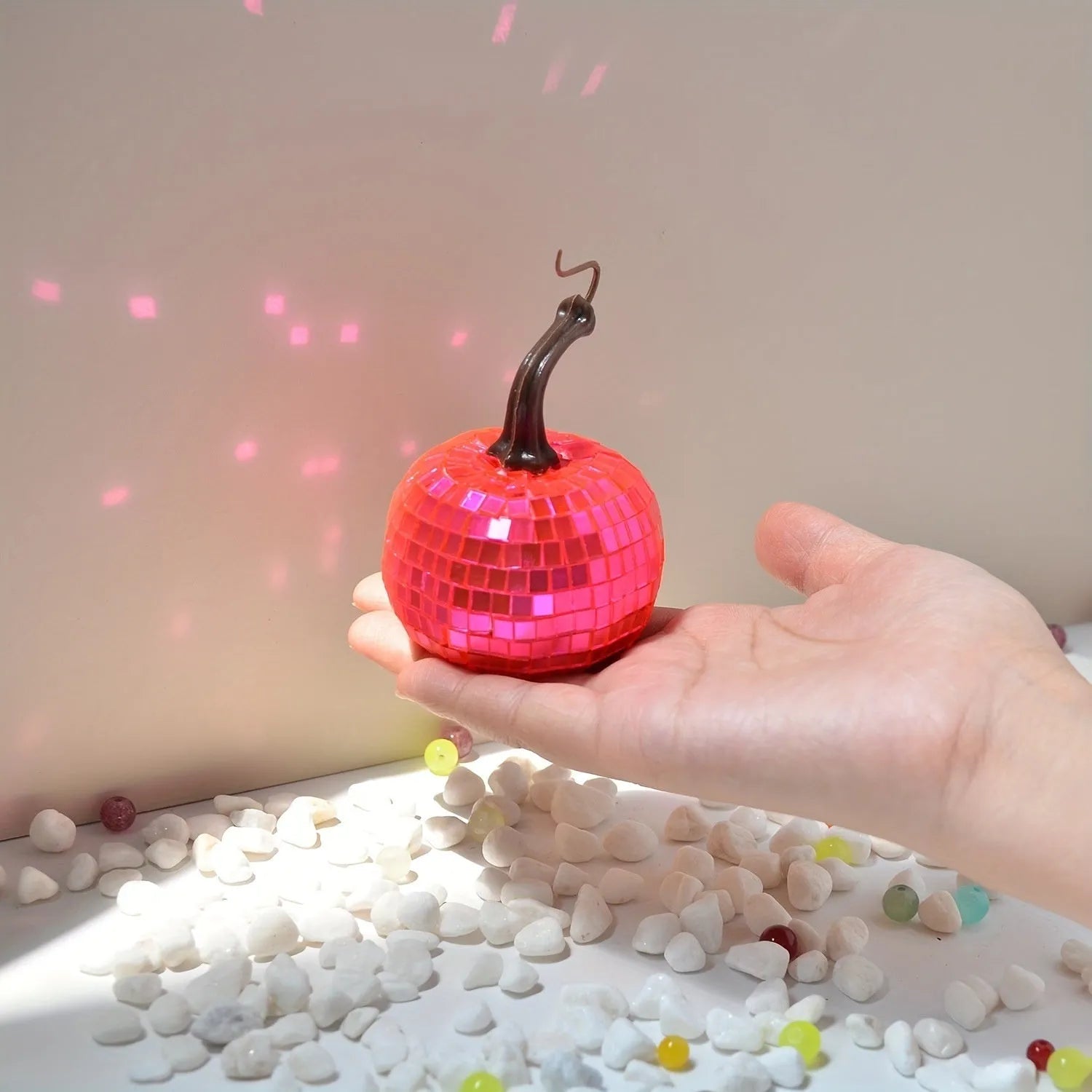 A Chinese-style glass pumpkin ornament with a mirror finish, shown in one of five available sizes.