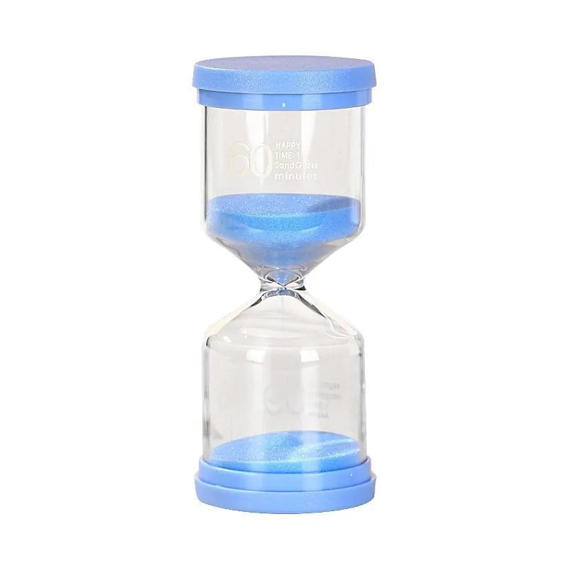Handmade glass sand timer hourglass in blue on a plain background.
