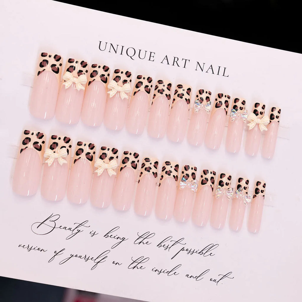 Leopard print false nail set with butterfly designs in WM296 colour