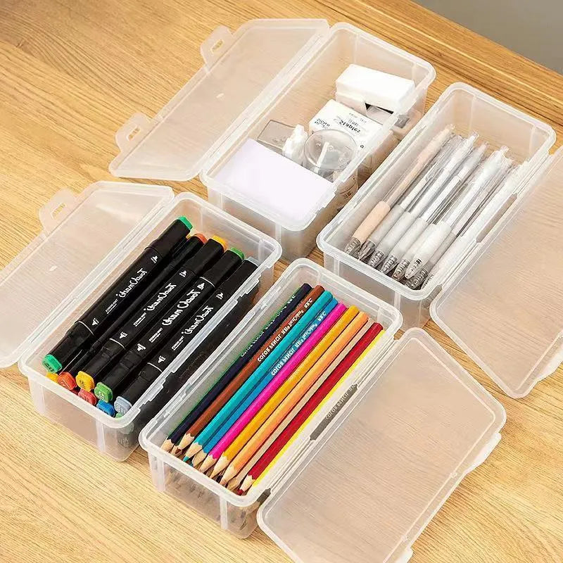 Transparent PP plastic stationery storage box with pencils and art supplies visible inside
