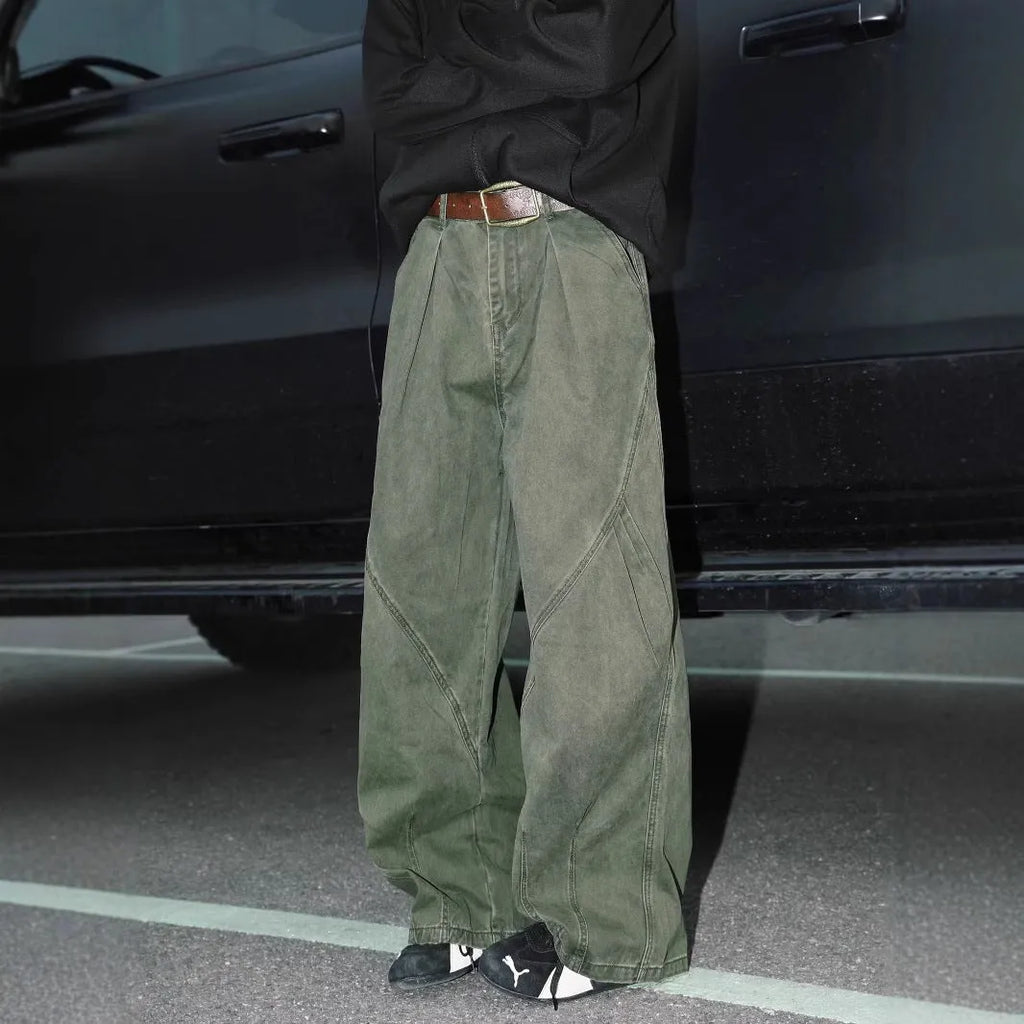 Men's pleated straight-leg trousers in apricot colour on a hanger