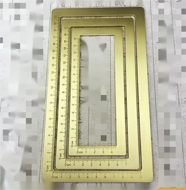 Solid brass calligraphy paper weight with carved square design for paper pressing
