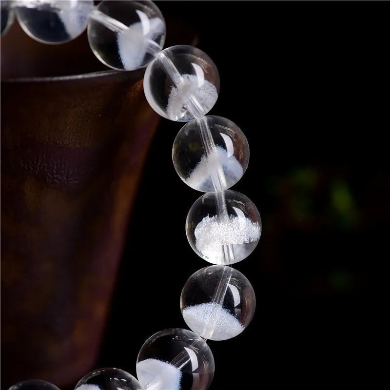 Women's white crystal bracelet with pyramid charm and Ruyi decorative elements