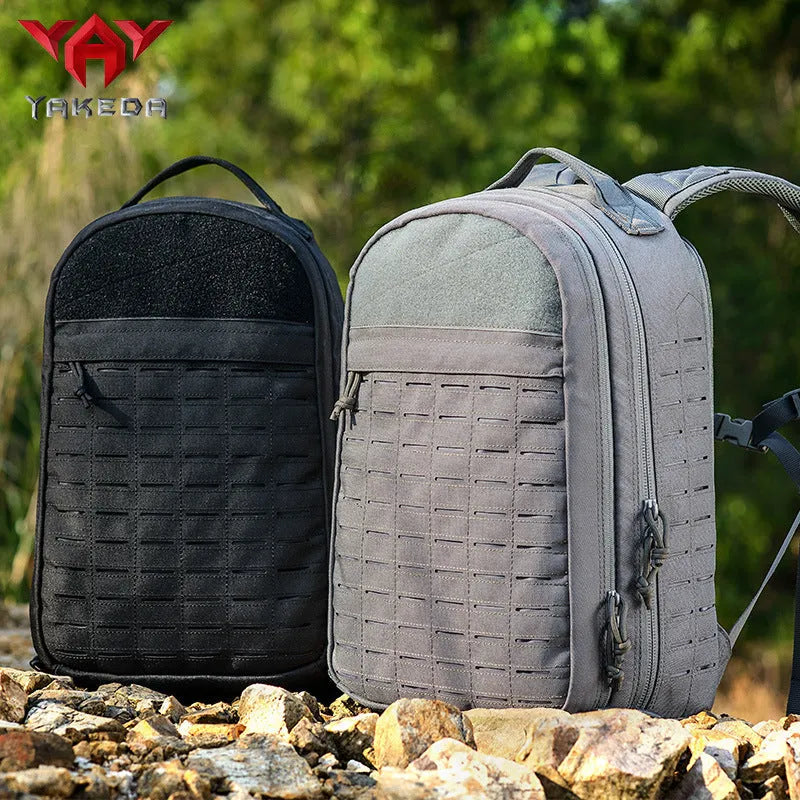 Outdoor hiking backpack in camouflage 600D polyester with 36-55L capacity and ergonomic shoulder strap