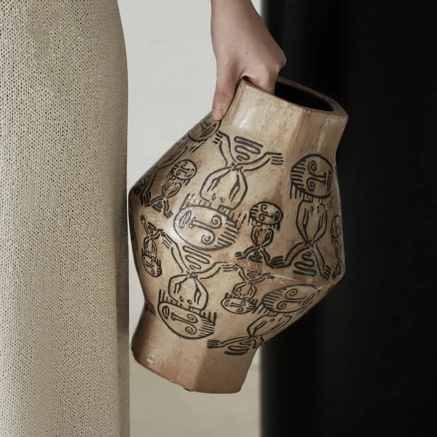 Hand-painted cylindrical ceramic vase with vintage carved tribal totem flower art.