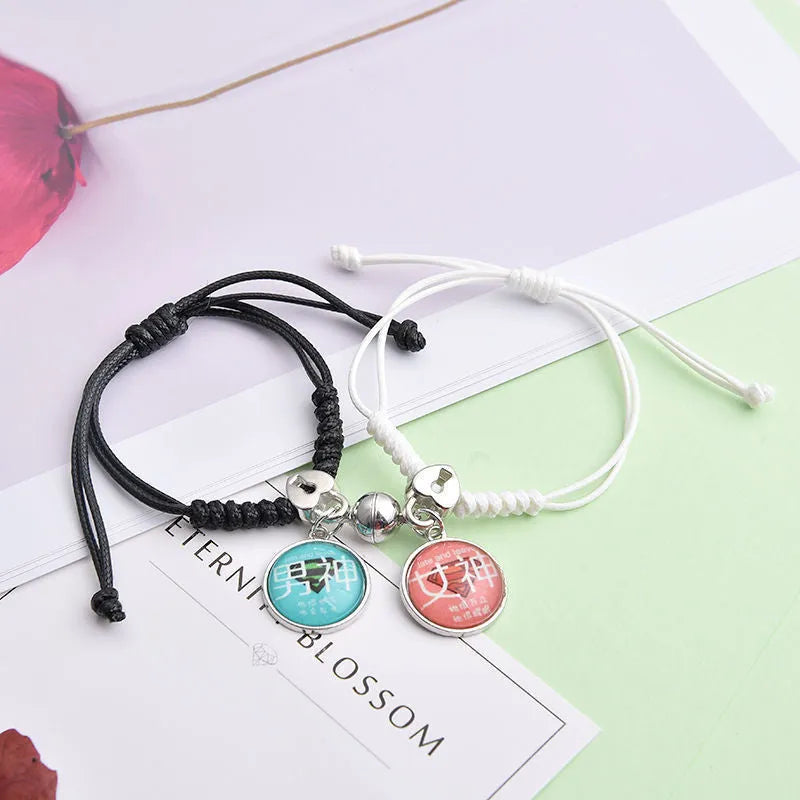 Magnetic clasp couple bracelets with alloy construction and symbolic designs including crown and love lock motifs.