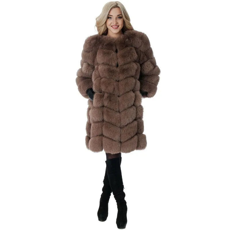Women's long artificial fur coat in wine red colour on a hanger