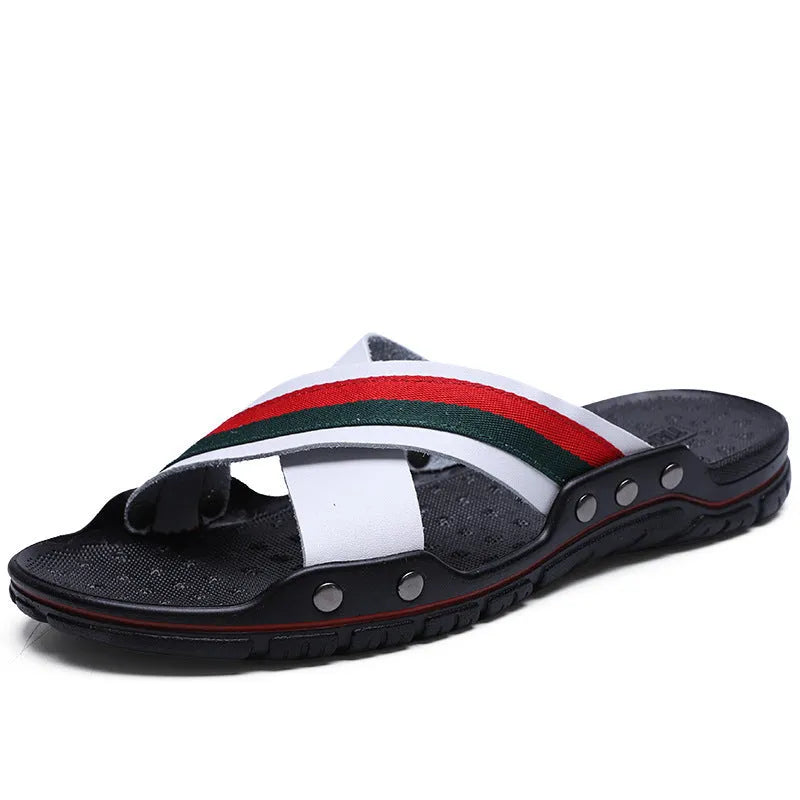 Men's white cowhide leather flip flops with a non-slip PU sole on a beach background.