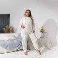 Women's milky white polyester lounge set with matching crew neck top and trousers