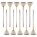 Ten champagne-coloured facial fan brushes with acrylic handles and protective covers.