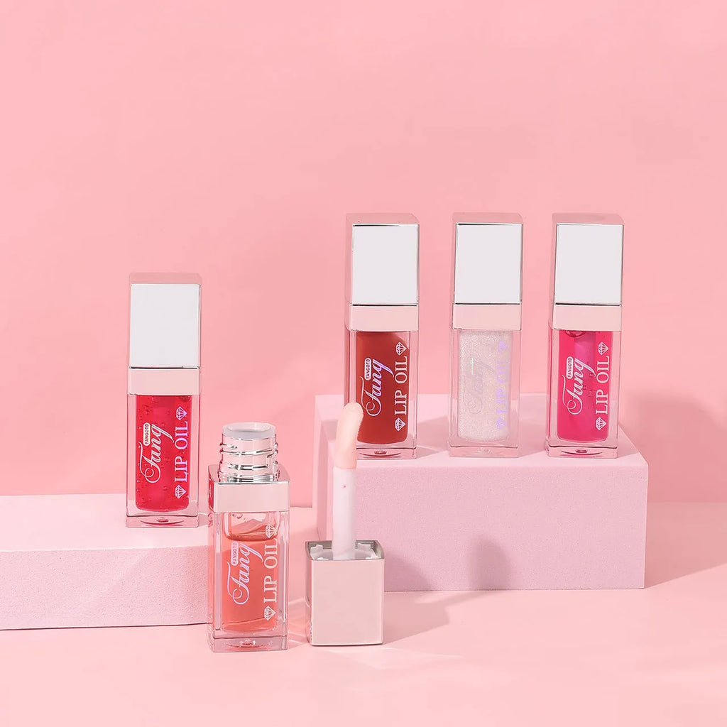 Five colour options of bright lip gloss mint lipstick with moisturising lip essence oil formula