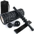 Black 33cm foam massage roller with six distinct segments for muscle recovery