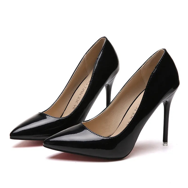 Women's pointed toe high heel pump with a stiletto heel above 8cm, shown in a nude colour with a buckle detail.