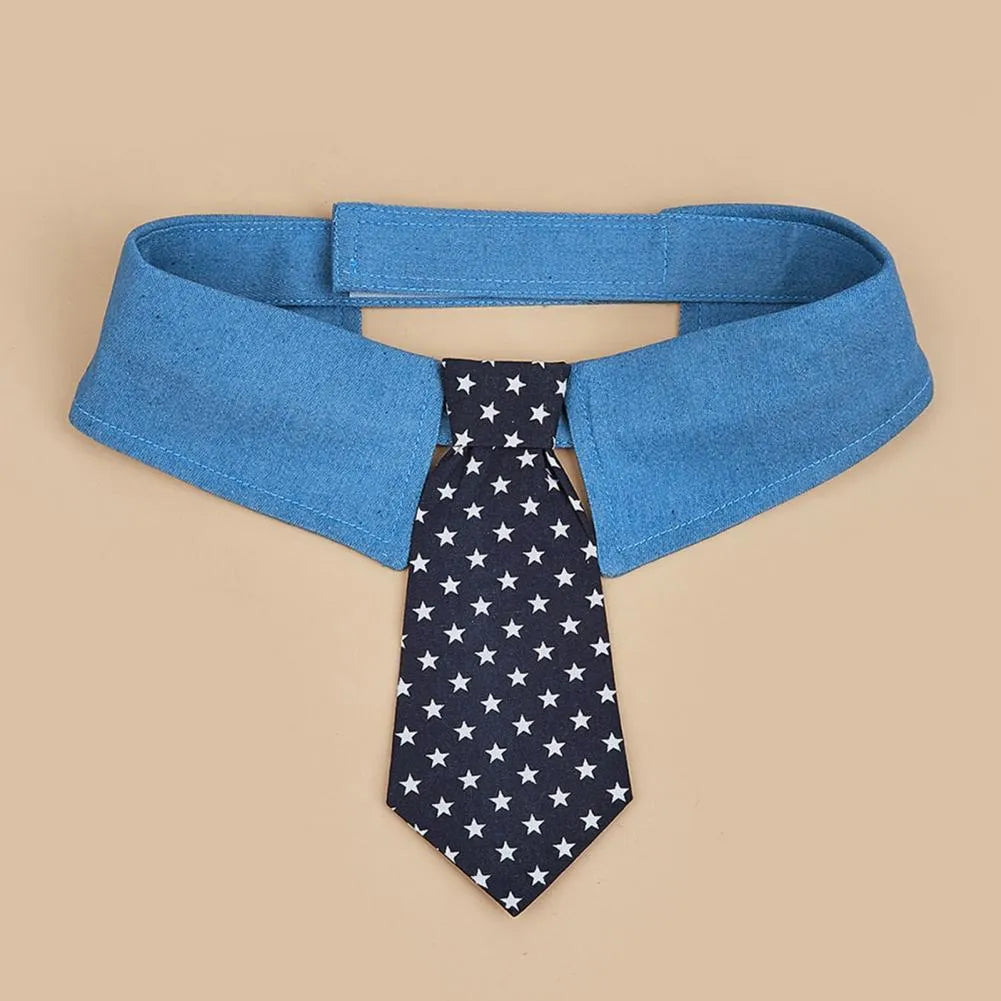 Blue denim dog collar with a star-pattern bow tie, shown with a fastener tape closure.