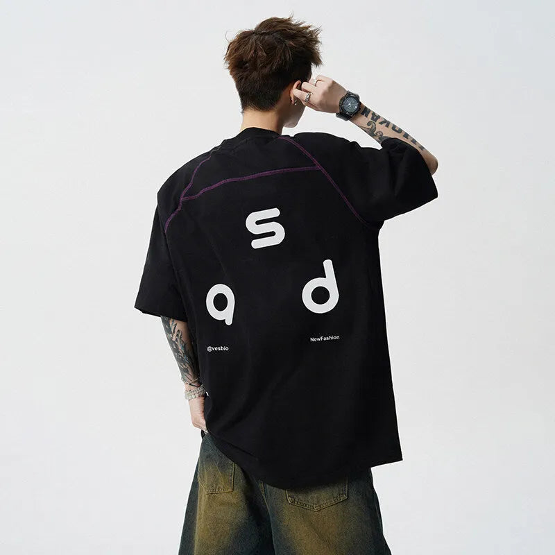 Cotton short-sleeve t-shirt with letter print design in loose fit showing round neck collar