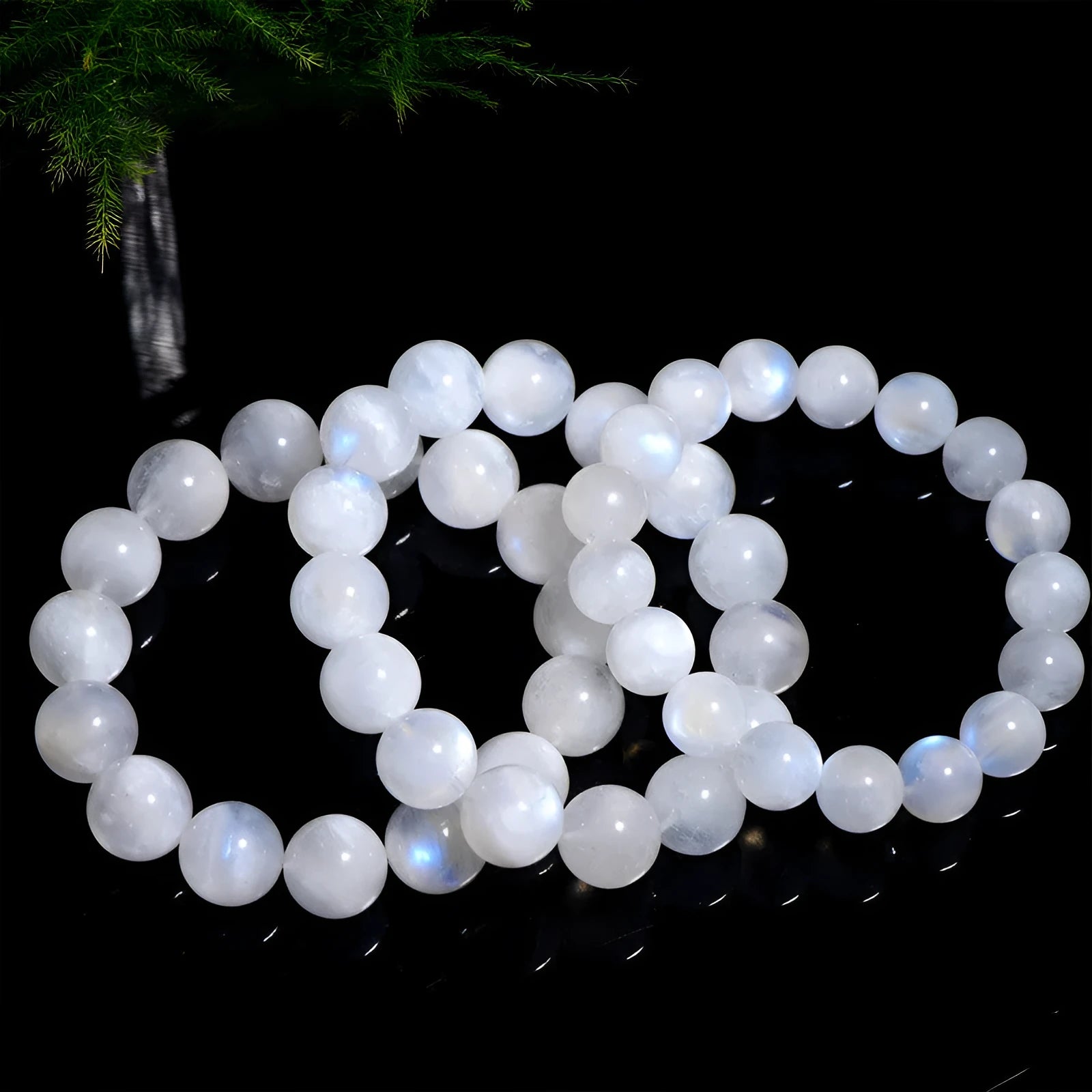 Natural blue moonlight round bead bracelet made from polished moonstone beads in geometric design