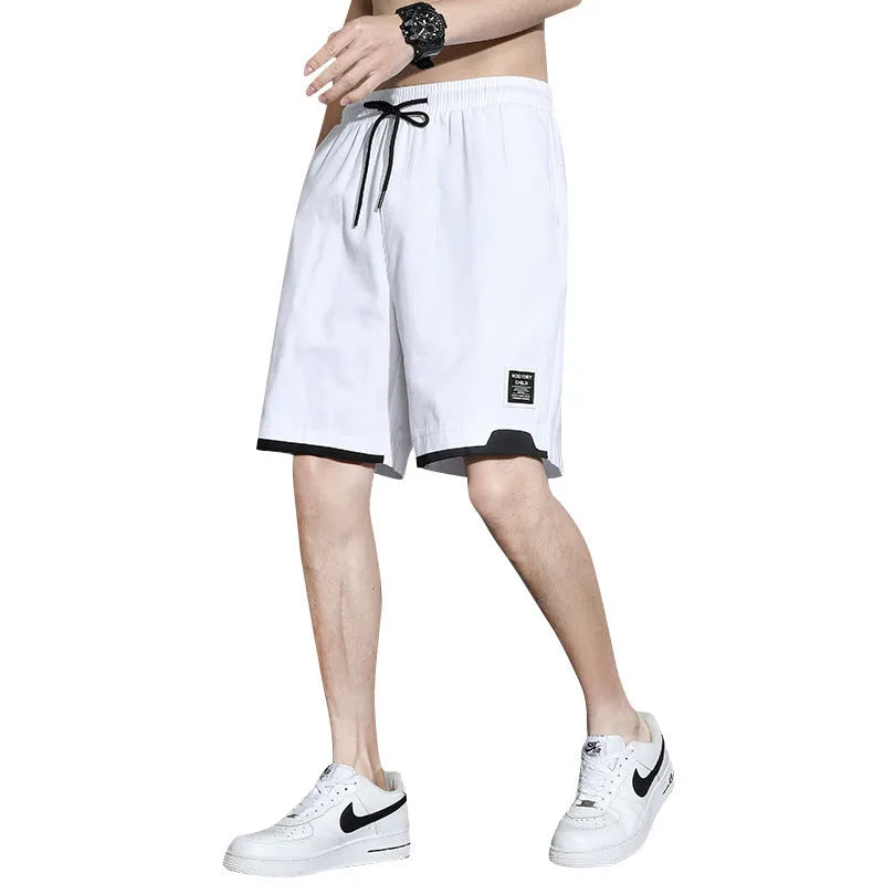 Boys' cotton shorts in black, shown in a casual style for summer home and sports wear.