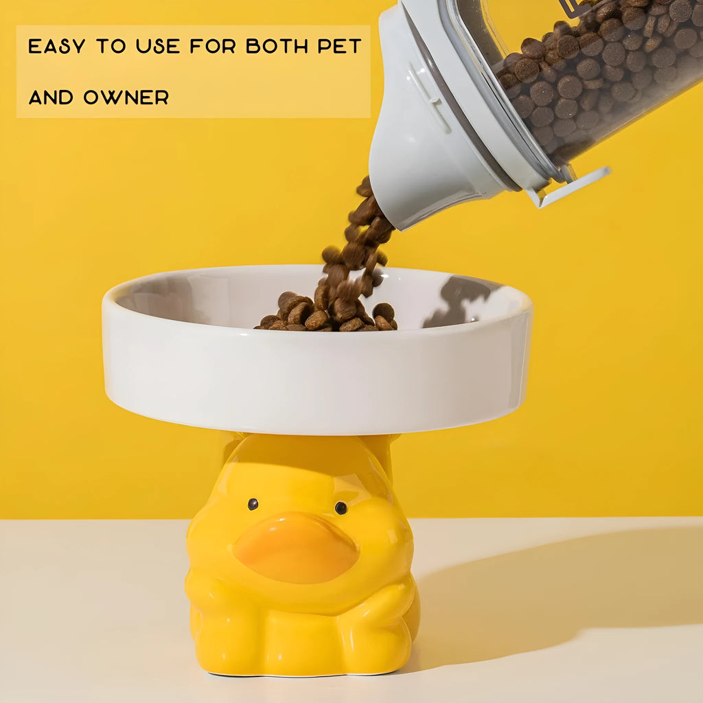Ceramic raised cat bowl in animal theme design on a floor
