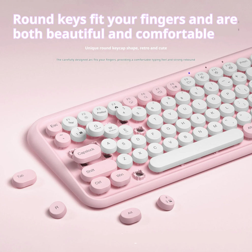 Pink wireless Bluetooth keyboard with 84 keys and compact portable design