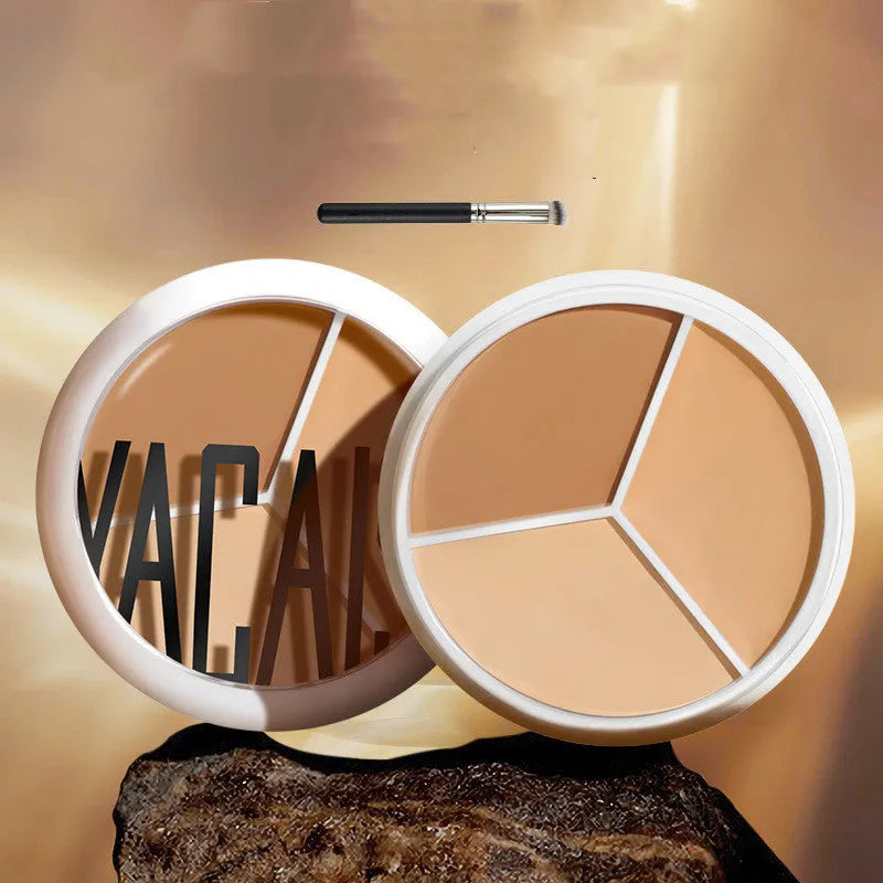 Three-colour waterproof concealer palette in ivory shade with optional brush for face application