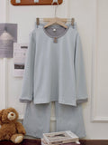 De velvet women's round neck pullover pyjama suit with striped trousers in light blue