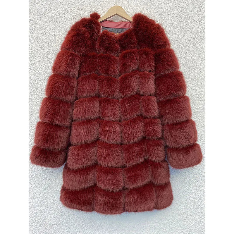 Women's long artificial fur coat in wine red colour on a hanger