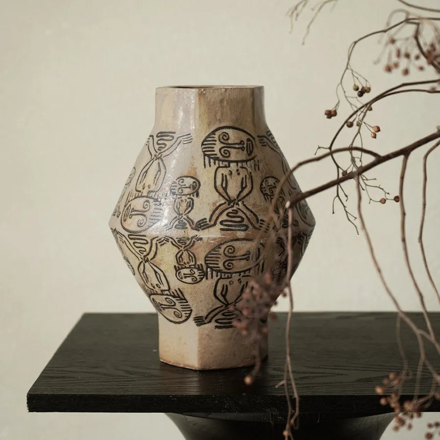 Hand-painted cylindrical ceramic vase with vintage carved tribal totem flower art.