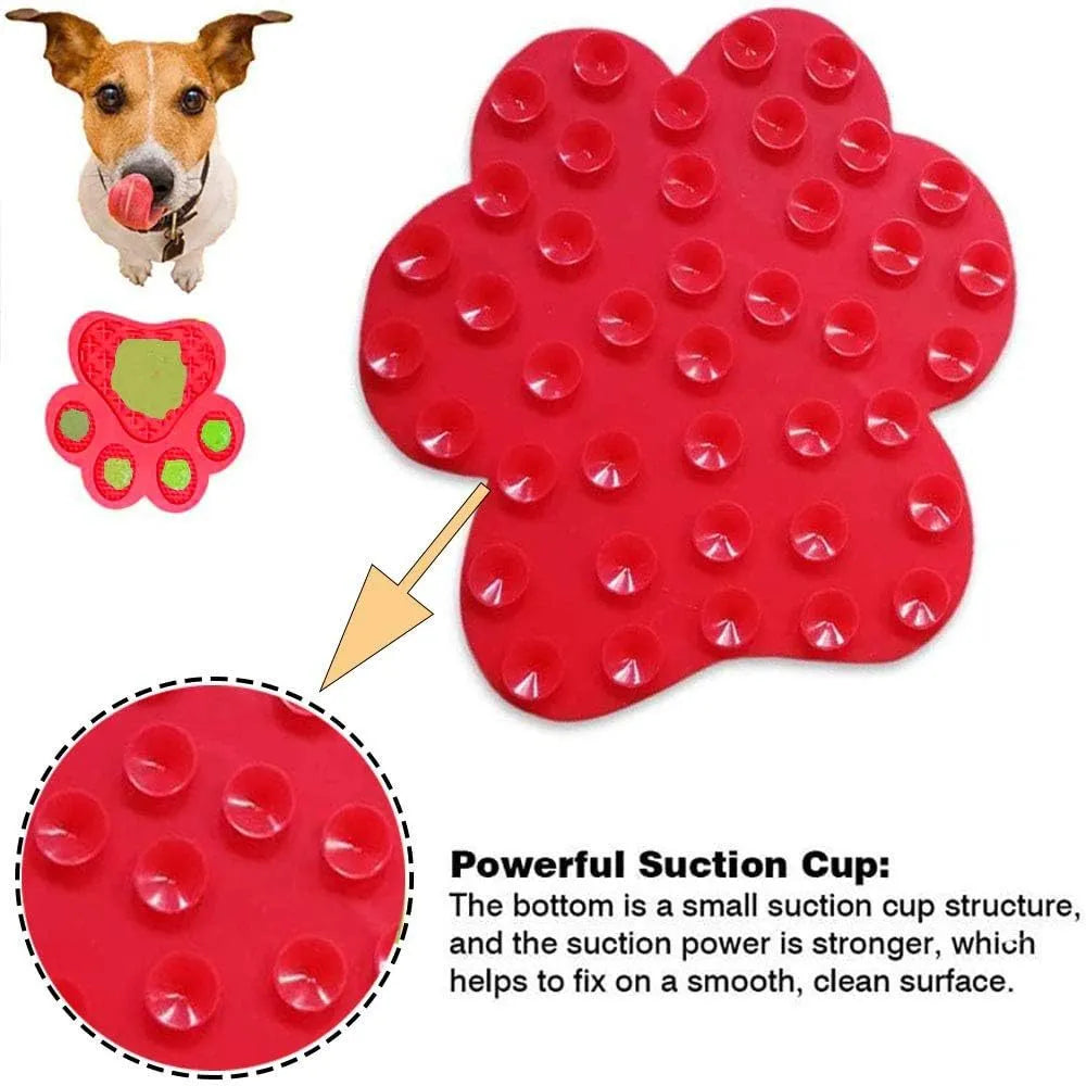 Blue silicone dog licking mat with bone texture and suction cups on back for bath time and slow feeding.