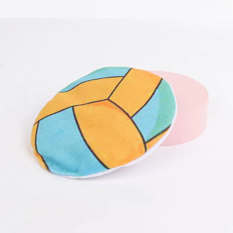 Plush flying disc cat toy with sports ball pattern, containing catnip and crinkle sound elements.