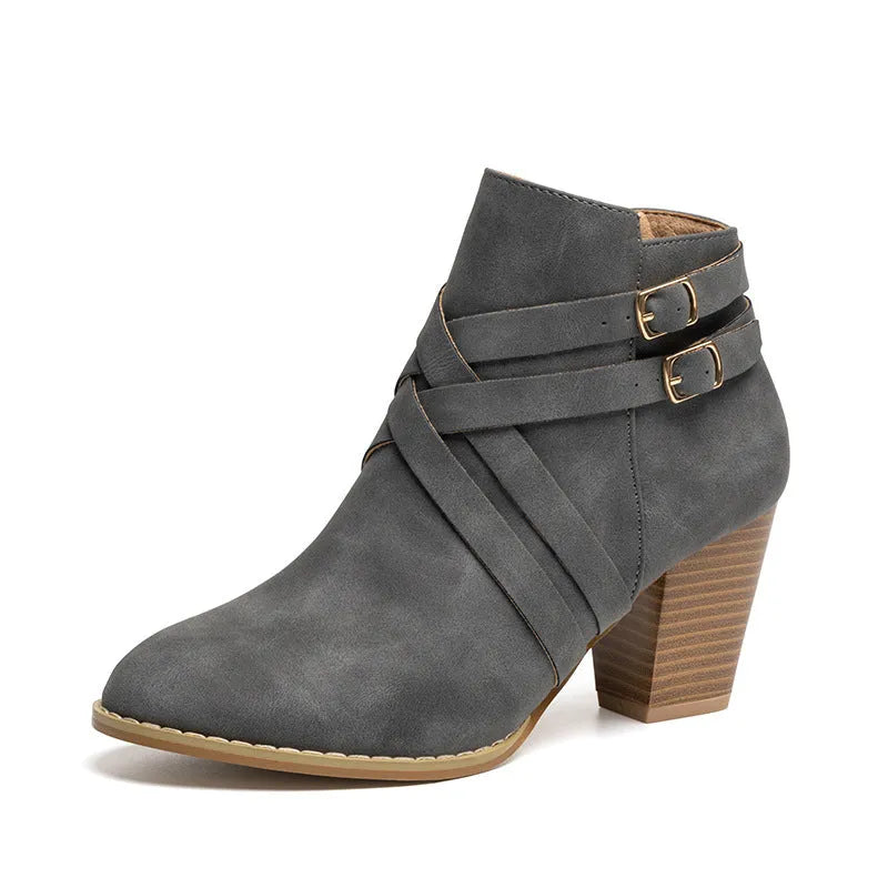 Grey plus size women's ankle boots with 7cm heel, side zip and belt buckle.