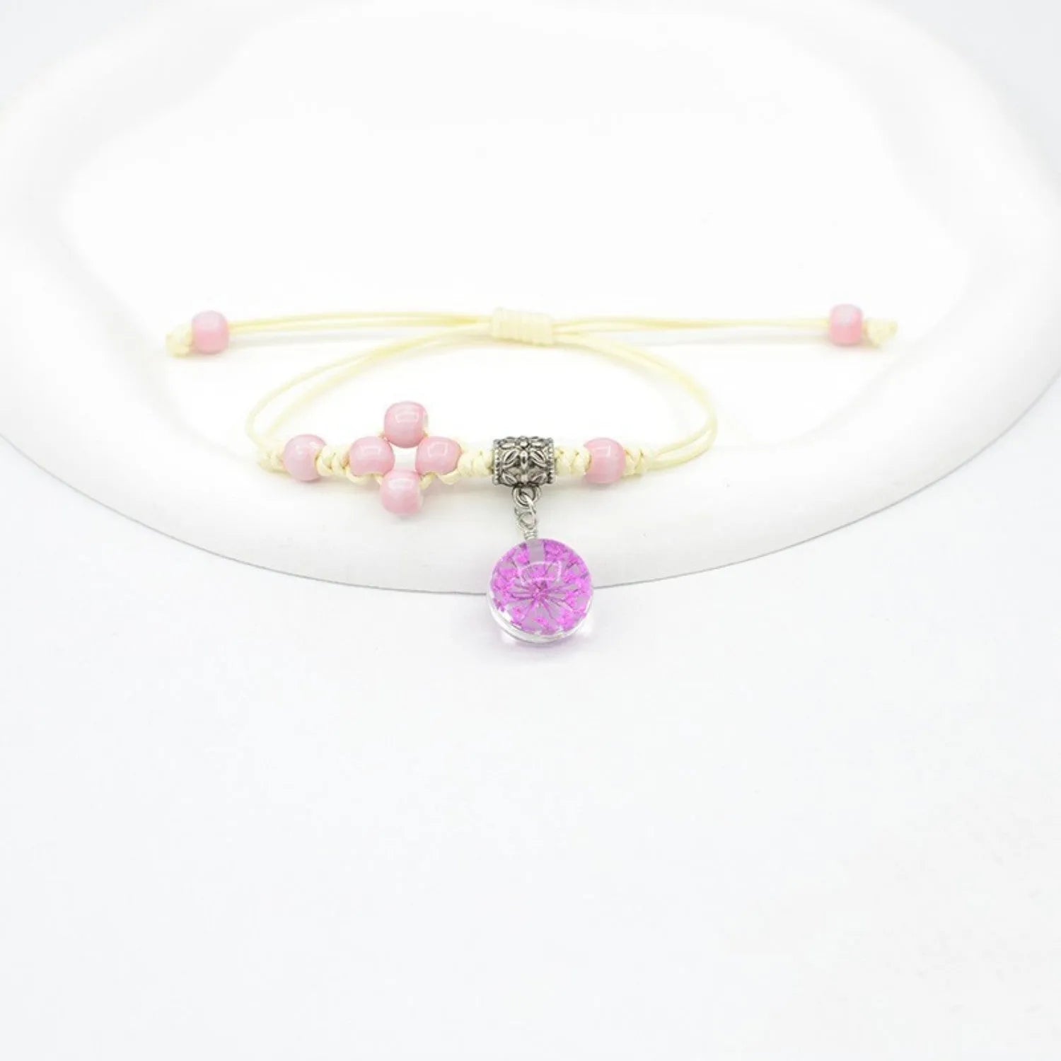 Women's hand-woven glass dried flower bracelet with large 1.4 cm beads in multiple colour options.