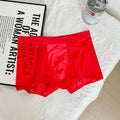 Seamless men's boxer shorts in ultra-thin ice silk nylon fabric, showing honeycomb crotch design.