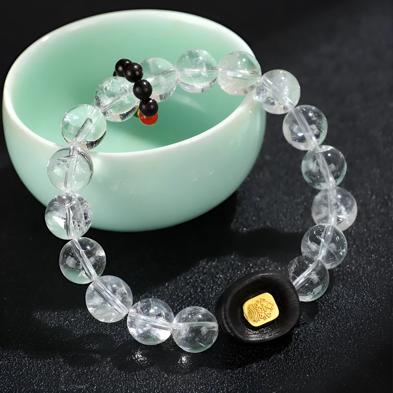 Natural white crystal ebony five warp handmade bracelet on neutral background