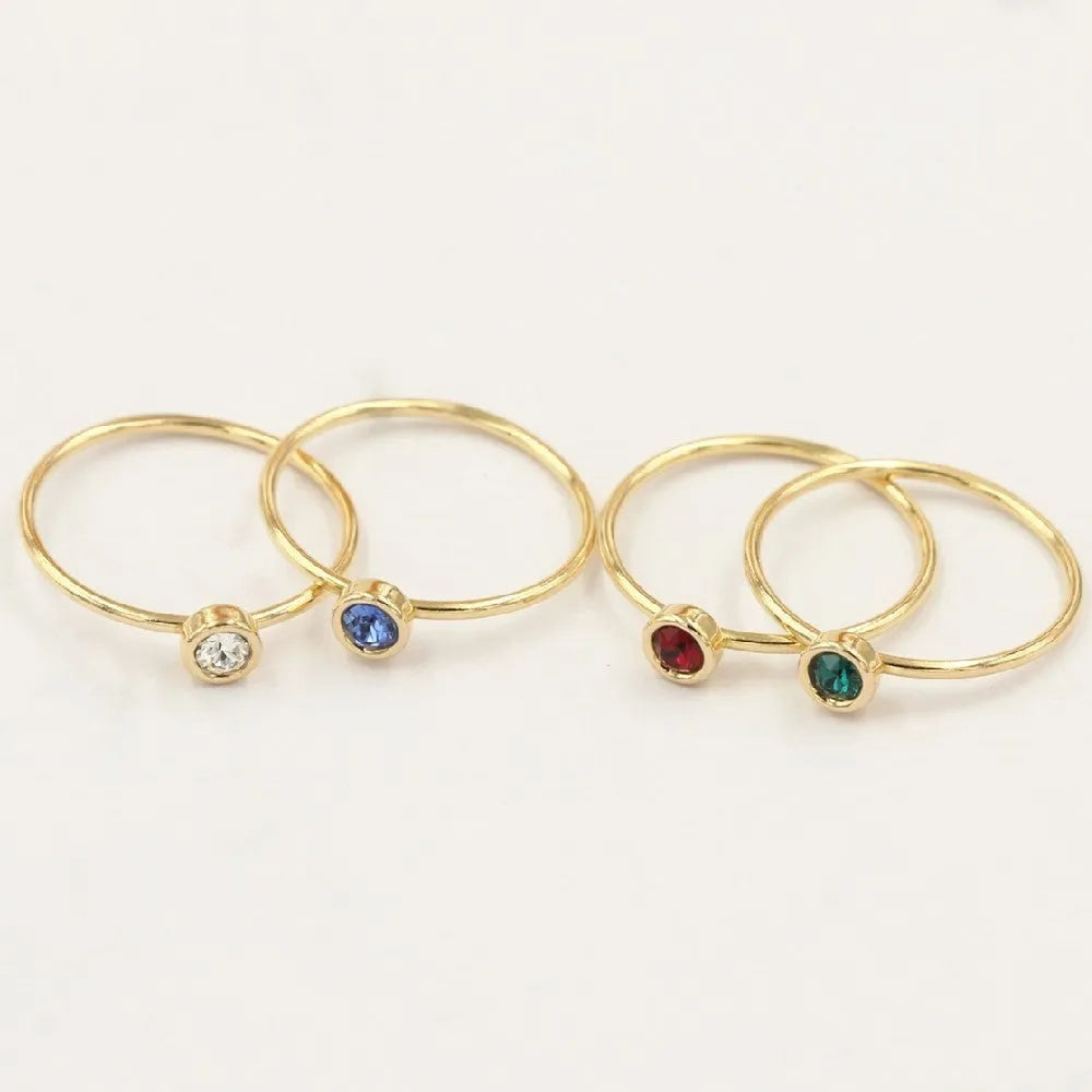 Women's 14K gilded zircon knuckle ring on copper body in green, blue, dark red or white