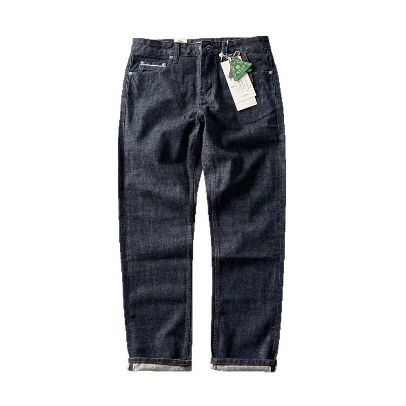 Men's primary colour straight leg denim jeans laid flat, showing mid waist and classic five-pocket design.