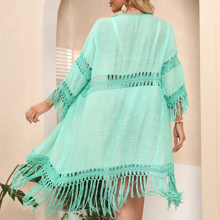 Women's yellow crochet cardigan beach cover-up with tassel stitching detail