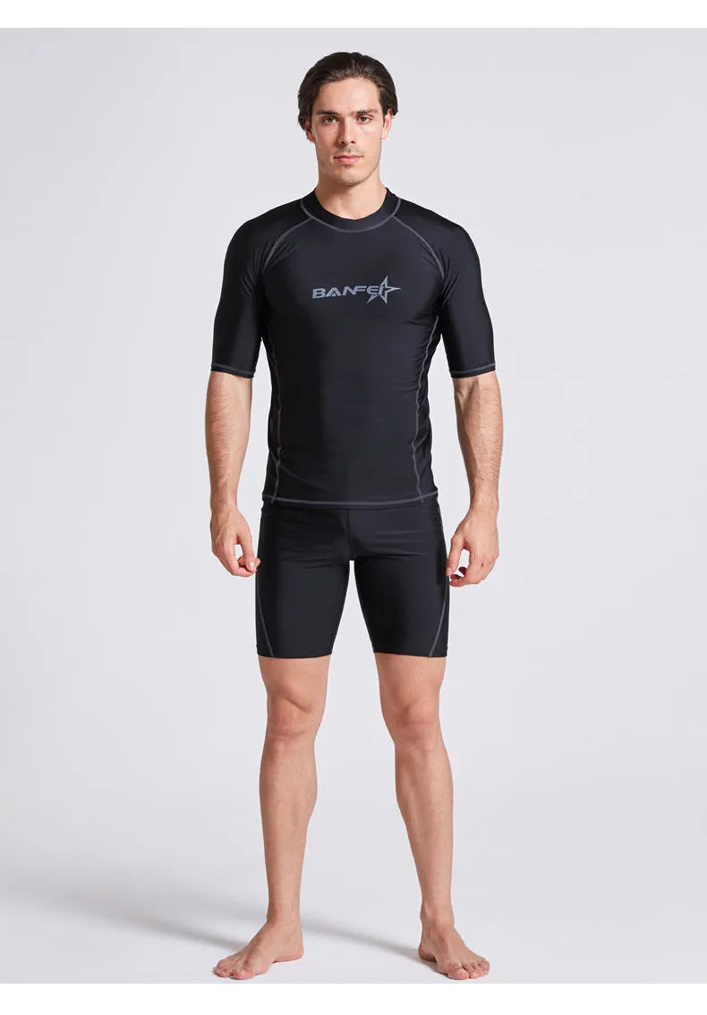 Men's half sleeve swimsuit wetsuit in nylon fabric for snorkelling and surfing activities