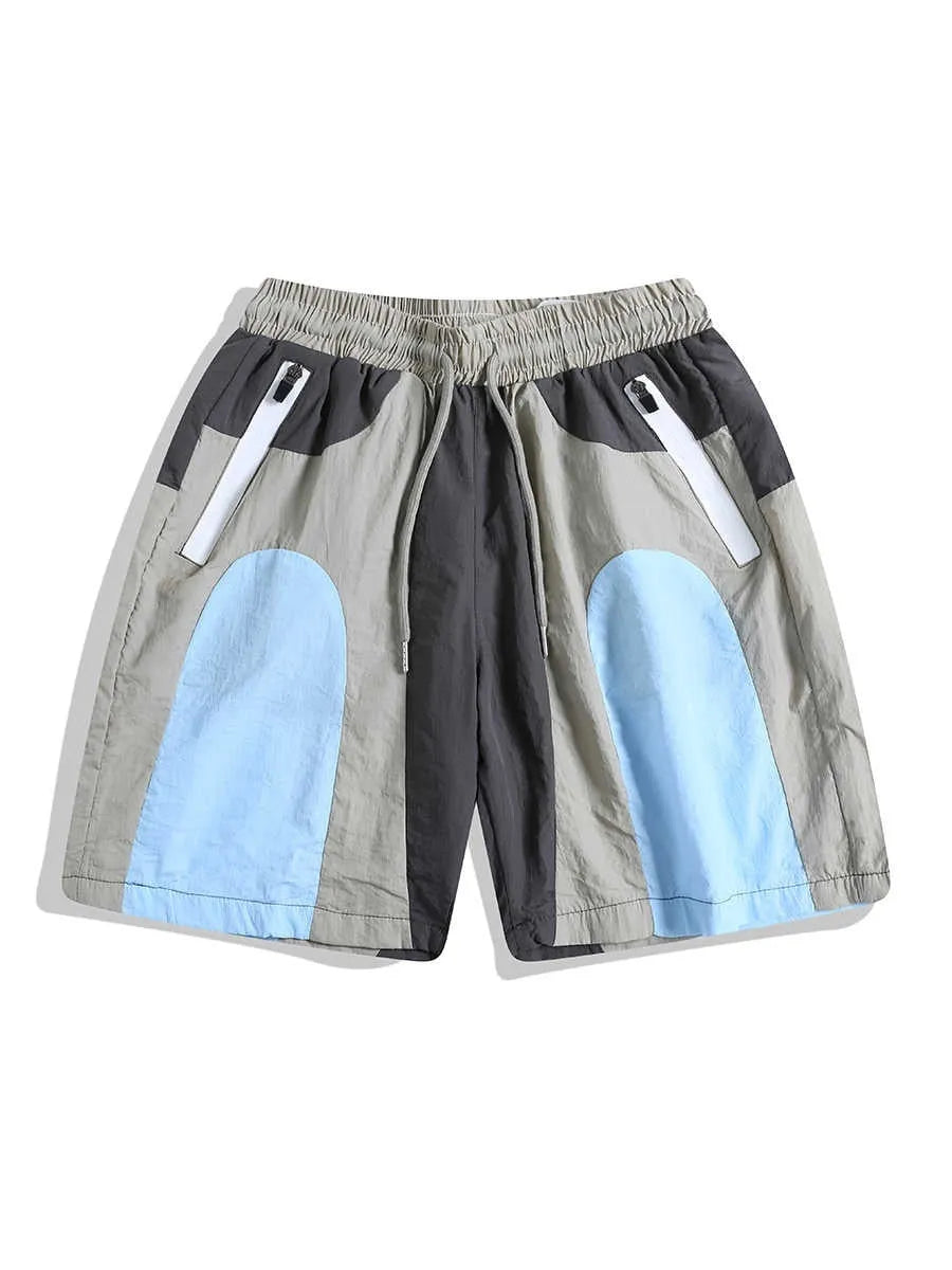 Blue patchwork men's beach shorts with elastic waist and straight-leg design for outdoor sports