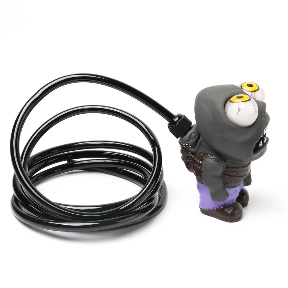 Turbo car Explosive Eye Doll ornament kit with pressure valve, copper tube, and mounting clip on a car dashboard vent.