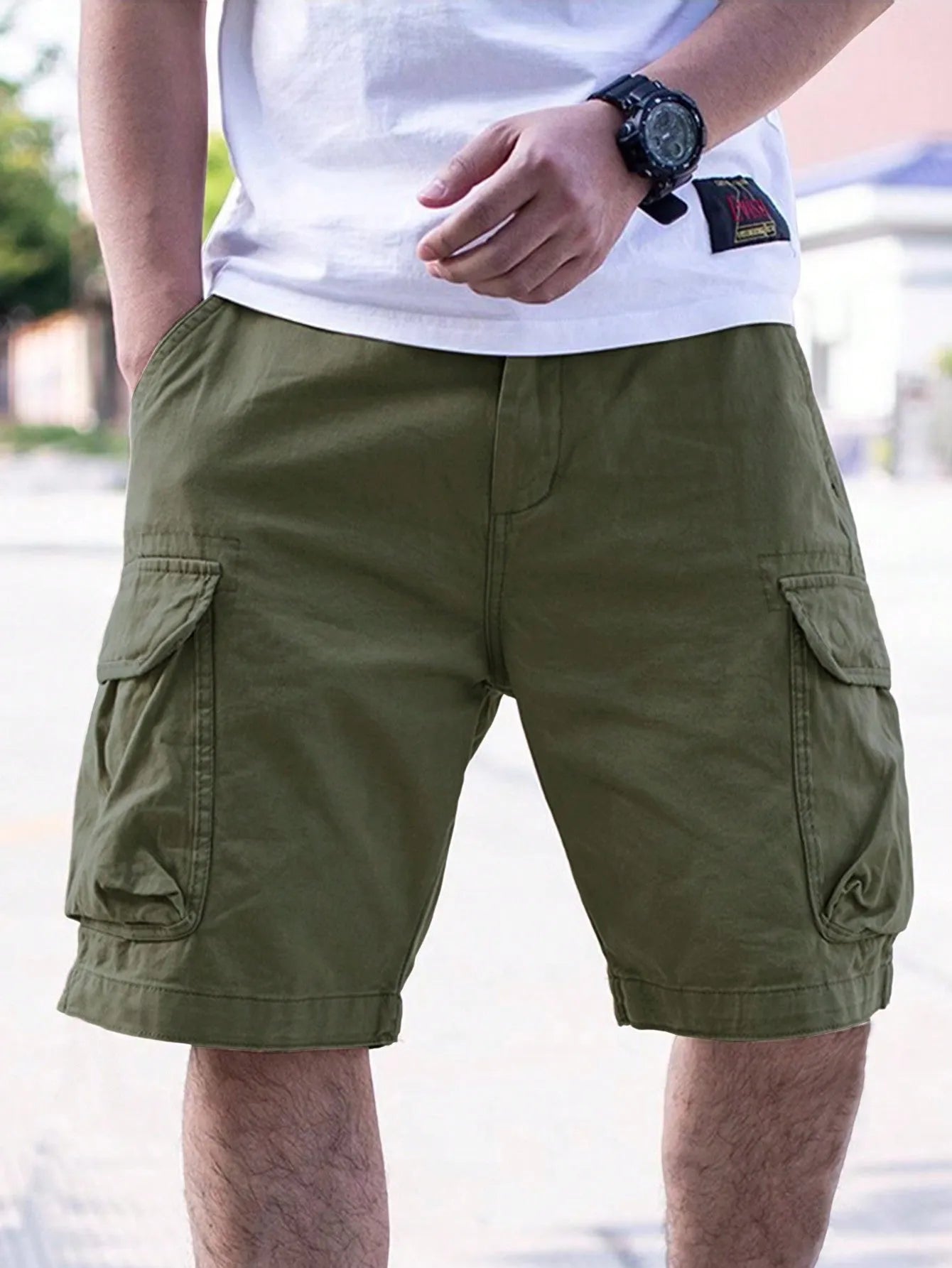 Men's loose fit cotton workwear shorts in Army Green colour showing retro style summer design