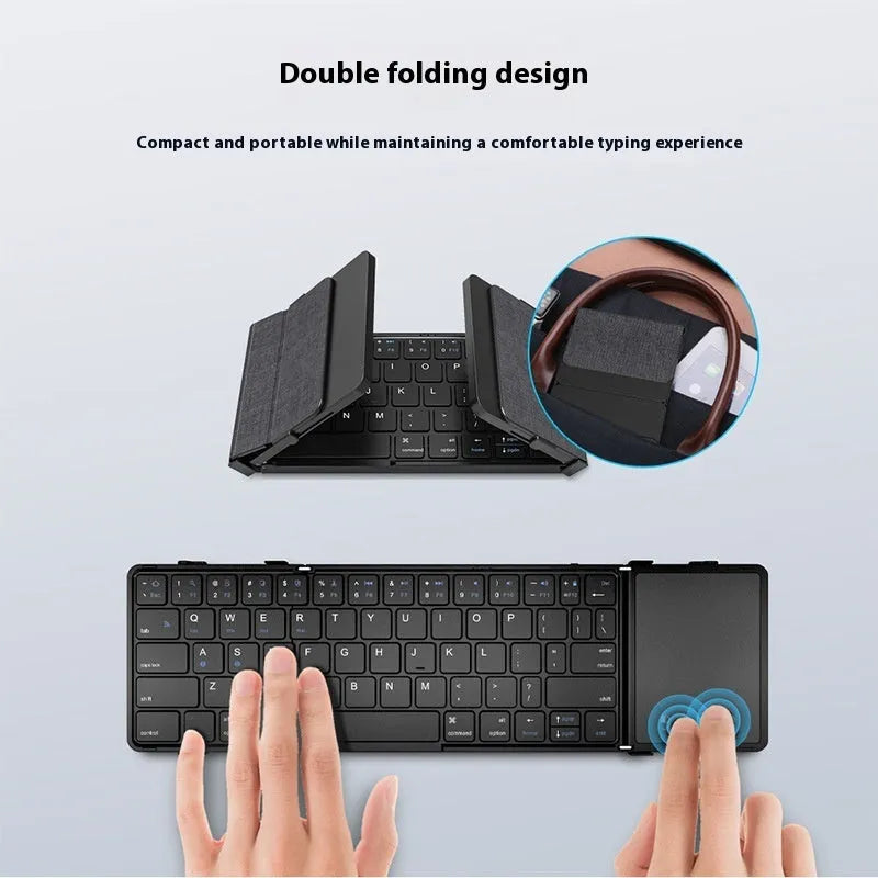 Black folding Bluetooth keyboard with touchpad option showing compact folded size