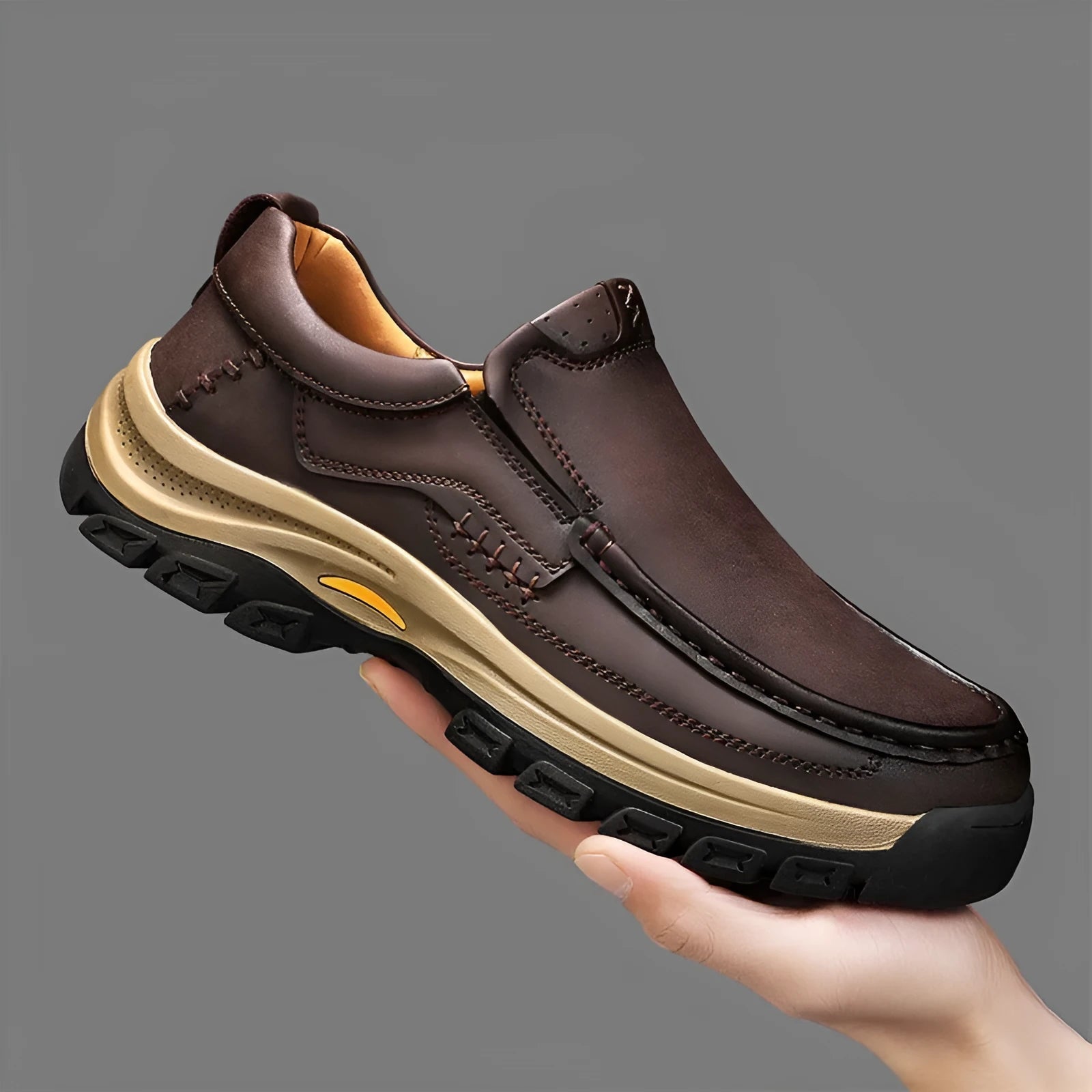 Men's black thick-soled mountaineering boots with round toe and rubber sole.
