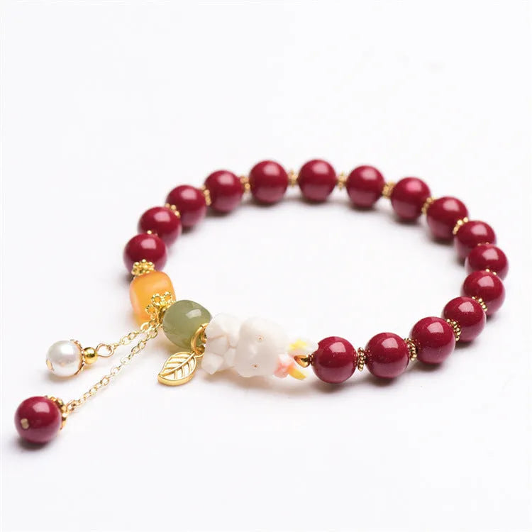 Natural cinnabar rabbit bracelet for women in national style, shown in 8mm and 10mm size options.