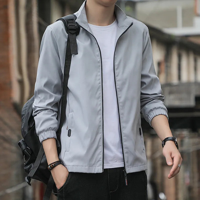 Korean style loose fit men's autumn jacket in black, shown with zip front and pockets