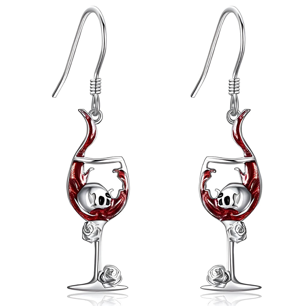 Close-up of a pair of geometric zinc alloy earrings with a skull and wine glass design and electroplated finish.