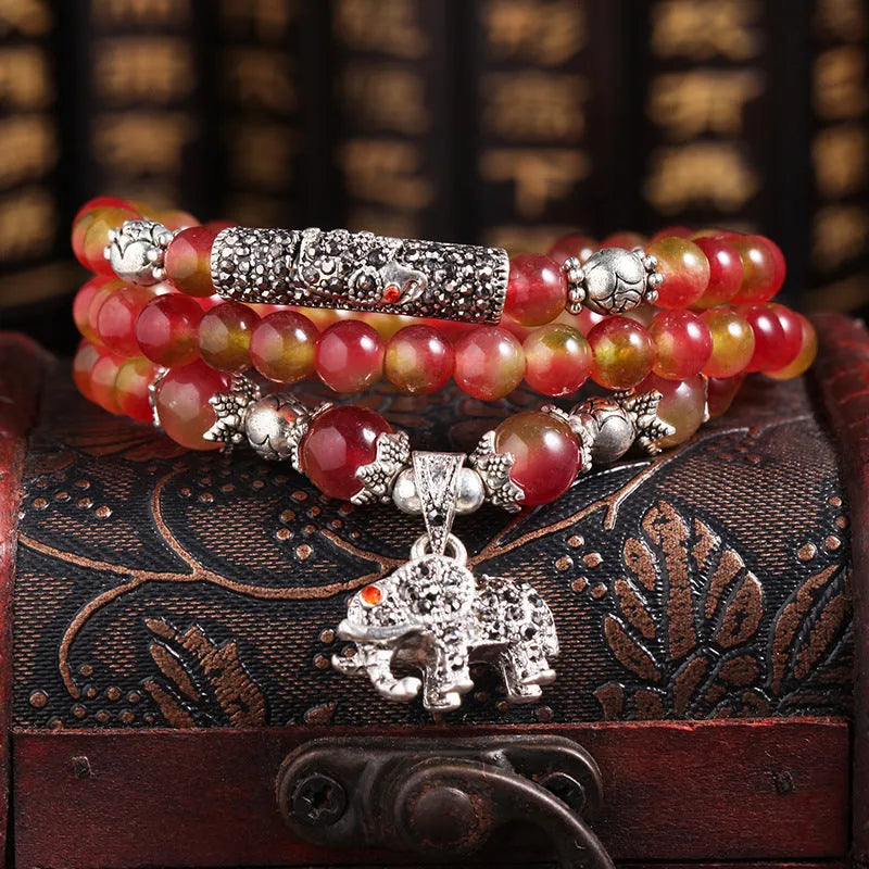 Handmade natural watermelon crystal bracelet with Chinese knot fastening and geometric beads